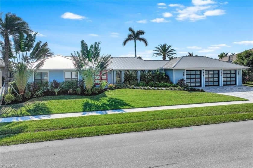 CAPTIVATING COASTAL HOME near Olde Marco!  Discover this - Beach Home for sale in Marco Island, Florida on Beachhouse.com