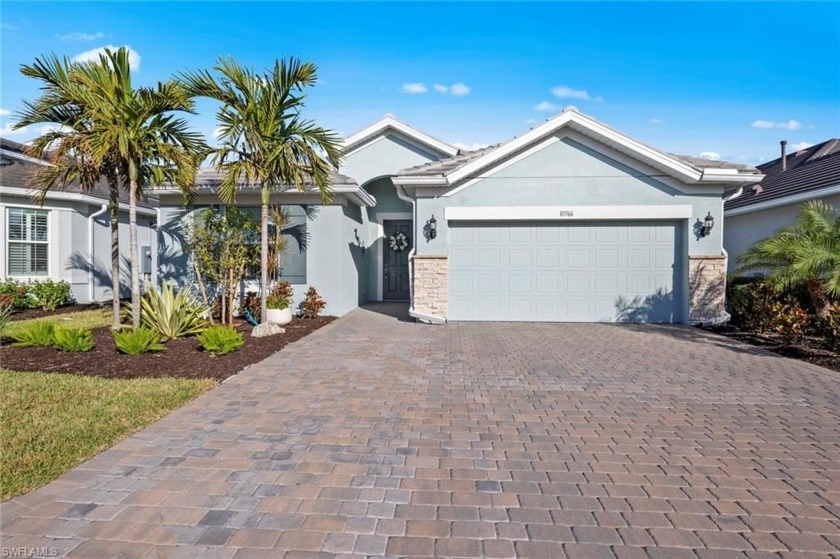 This highly sought after *Expanded* Summerwood floor plan by - Beach Home for sale in Estero, Florida on Beachhouse.com