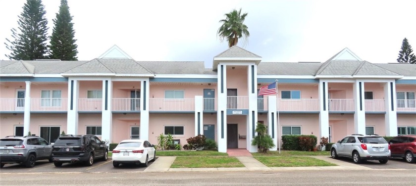 Welcome home! Water views! Wow! This first floor unit has 1,210 - Beach Condo for sale in Clearwater, Florida on Beachhouse.com