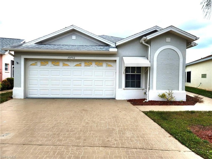 This perfectly located 3-bedroom home with a 2-car garage is - Beach Home for sale in Estero, Florida on Beachhouse.com