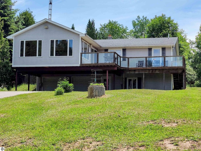 Relax on your large deck and enjoy the peaceful setting with - Beach Home for sale in Frankfort, Michigan on Beachhouse.com