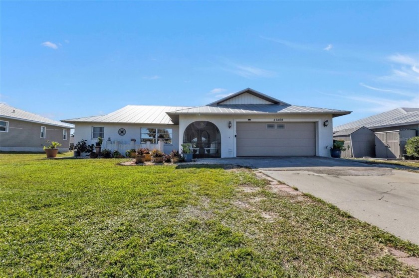 Beautiful waterfront retreat with a 60 foot dock!  Discover your - Beach Home for sale in Punta Gorda, Florida on Beachhouse.com