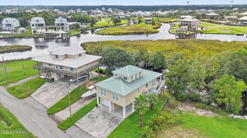 Discover the ultimate coastal retreat with this waterfront home - Beach Home for sale in Bay Saint Louis, Mississippi on Beachhouse.com