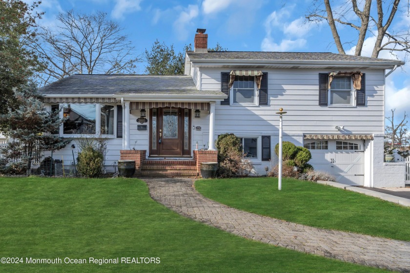 Approximately one mile to Spring Lake Beaches sits this 3 - Beach Home for sale in Spring Lake, New Jersey on Beachhouse.com