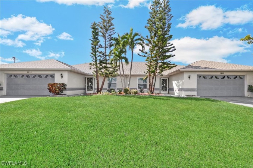 Turnkey Income-Producing Duplex with Pool on Freshwater Canal - - Beach Townhome/Townhouse for sale in Cape Coral, Florida on Beachhouse.com