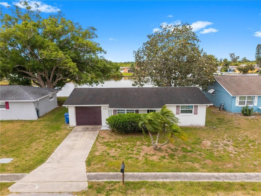 Welcome to this beautifully maintained waterfront 2-bedroom - Beach Home for sale in Holiday, Florida on Beachhouse.com