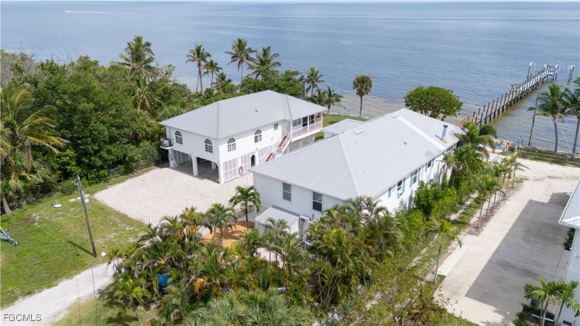 Re-listed with a PRICE IMPROVEMENT! This Bokeelia home is a rare - Beach Home for sale in Bokeelia, Florida on Beachhouse.com