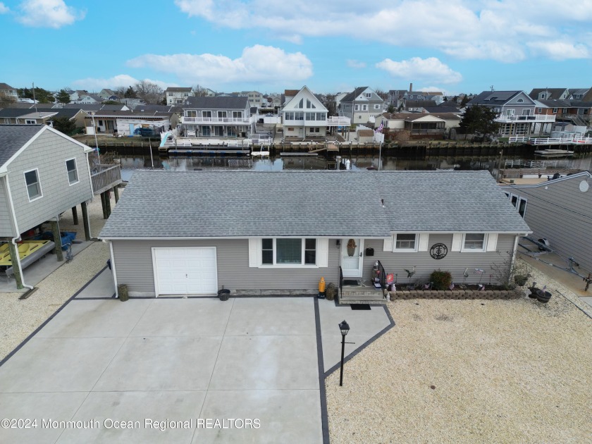 Discover waterfront living at its finest with this stunning - Beach Home for sale in Little Egg Harbor, New Jersey on Beachhouse.com
