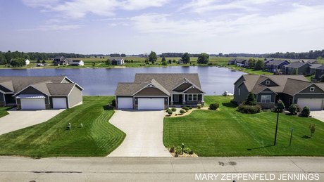 Experience the epitome of lakeside living in this immaculate - Beach Home for sale in West Olive, Michigan on Beachhouse.com