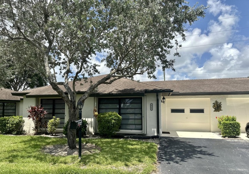 PRICED TO SELL! This 2/2 Beautiful Villa Is Ready For It's New - Beach Home for sale in Boynton Beach, Florida on Beachhouse.com