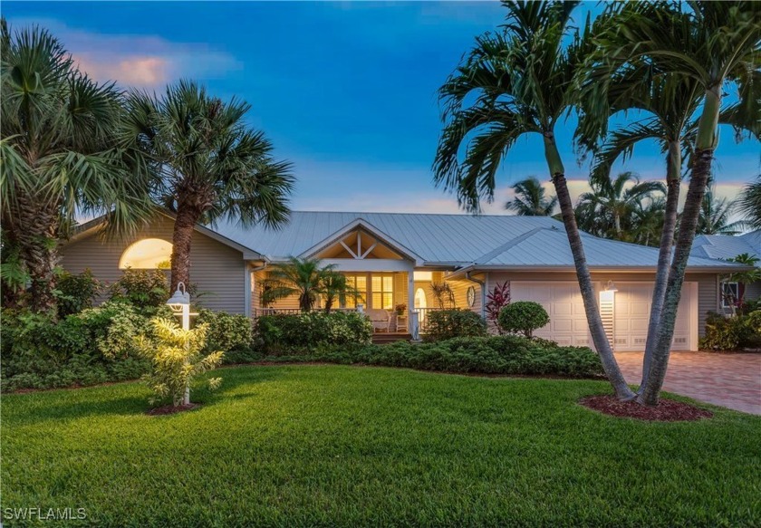 LAKEFRONT Southern Exposure POOL HOME with UPDATED KITCHEN and - Beach Home for sale in Fort Myers, Florida on Beachhouse.com