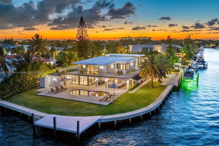 Experience unrivaled luxury in this meticulously renovated Point - Beach Home for sale in North Miami, Florida on Beachhouse.com