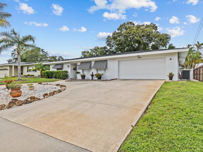 This beautifully maintained and updated 3-bedroom, 2-bathroom - Beach Home for sale in Palm Harbor, Florida on Beachhouse.com