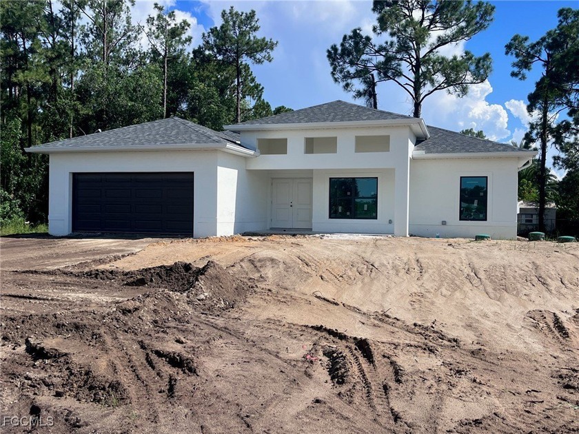 Spectacular New Casariego Development 4 bed/2 bath with 2 car - Beach Home for sale in Lehigh Acres, Florida on Beachhouse.com