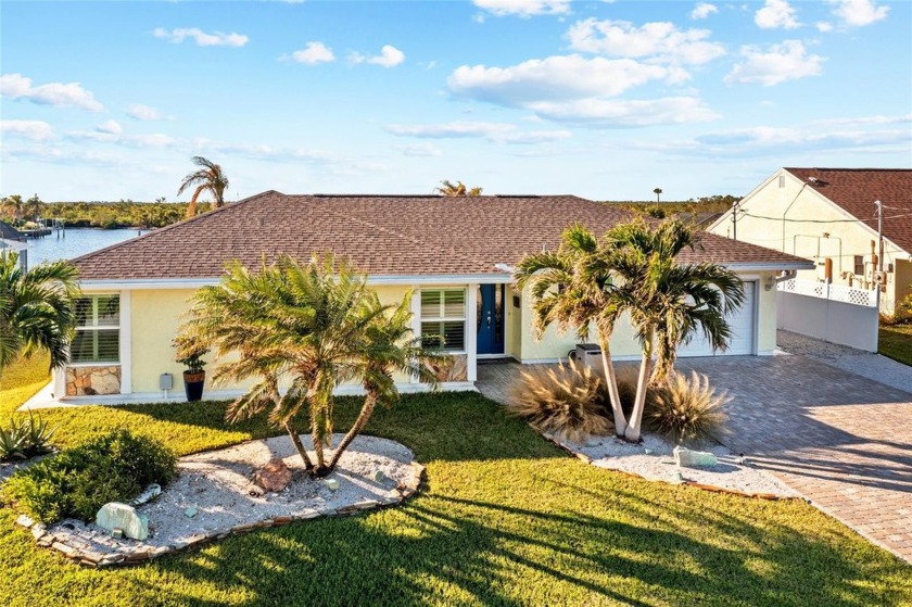 PRIME WATERFRONT IN PORT CHARLOTTE! This beautifully remodeled 3 - Beach Home for sale in Port Charlotte, Florida on Beachhouse.com