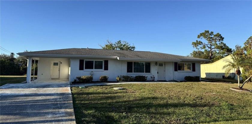 This 3 bedroom, 2 bath, split floor plan home is located on a - Beach Home for sale in Port Charlotte, Florida on Beachhouse.com