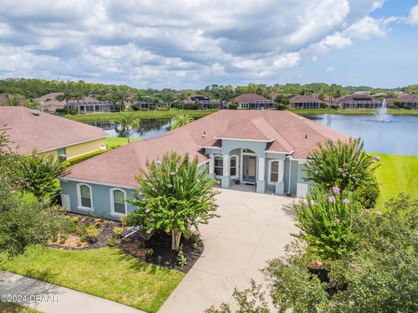 Welcome to the sought-after golf community of Promenade Park - Beach Home for sale in New Smyrna Beach, Florida on Beachhouse.com