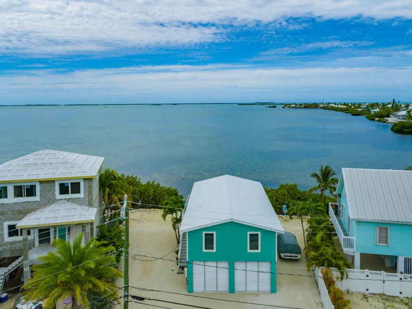 Introducing Bayview Cottage...a lovely coastal charmer perched - Beach Home for sale in Ramrod Key, Florida on Beachhouse.com