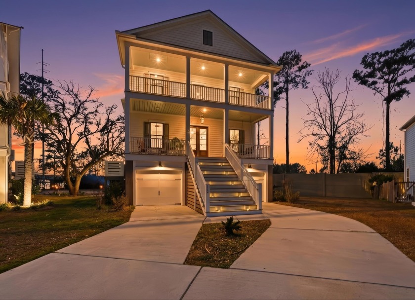 Set along the scenic banks of the Wando River, this - Beach Home for sale in Charleston, South Carolina on Beachhouse.com