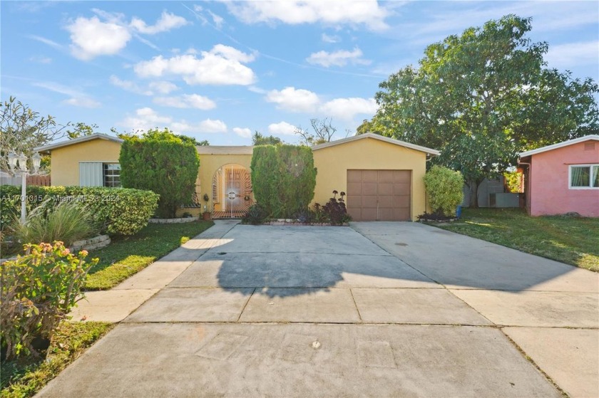 Welcome to this beautifully maintained pool home on a serene - Beach Home for sale in Margate, Florida on Beachhouse.com