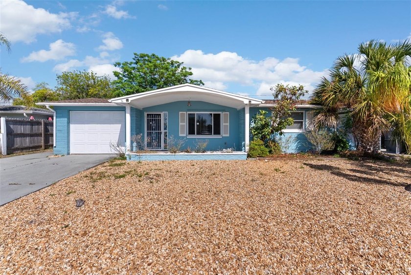 Short Sale. Spacious 4-bedroom, 2-bath block home in Holiday - Beach Home for sale in Holiday, Florida on Beachhouse.com