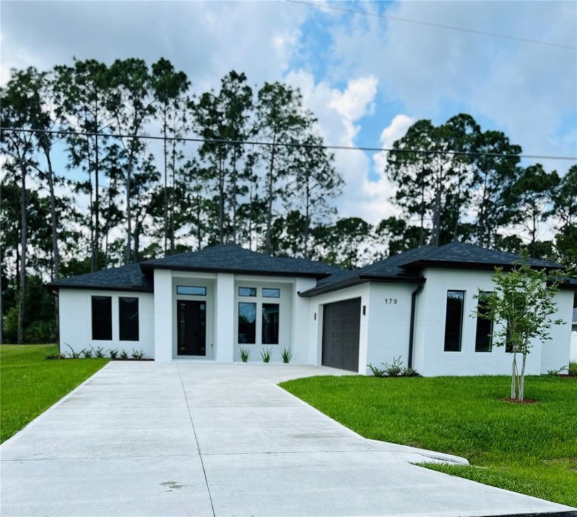 NEW CONSTRUCTION ON FRESH WATER CANAL!!!This home is a clean - Beach Home for sale in Palm Coast, Florida on Beachhouse.com