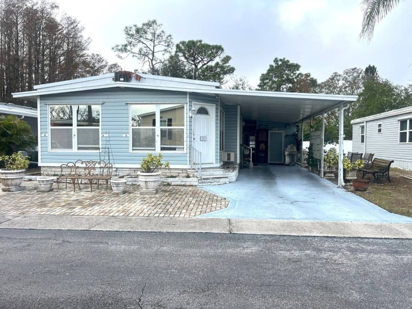 This is a 2-Bedroom, 2-Bathroom FULLY FURNISHED home that is - Beach Home for sale in Tarpon Springs, Florida on Beachhouse.com