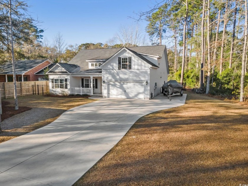 Like new, 2022 build, 4 bed/3  1/2  bath in Hagley Estates, with - Beach Home for sale in Pawleys Island, South Carolina on Beachhouse.com