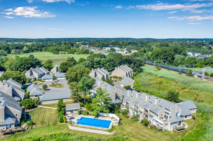 Step into coastal sophistication with this three-story townhouse - Beach Condo for sale in Guilford, Connecticut on Beachhouse.com