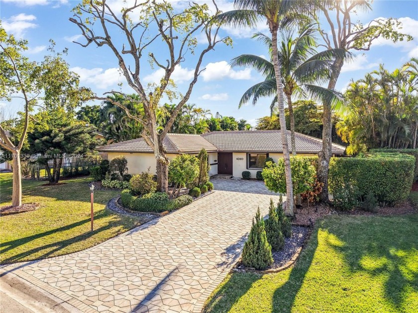 This property boasts a nearly 15,000 lot with landscaped - Beach Home for sale in Coral Springs, Florida on Beachhouse.com