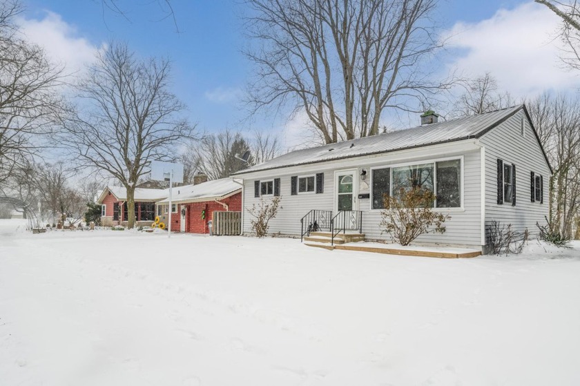 This cozy ranch-style home features 3 bedrooms and 1 bath - Beach Home for sale in South Haven, Michigan on Beachhouse.com