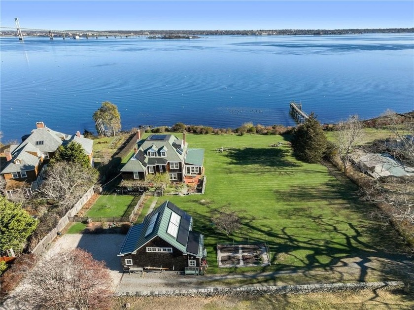 This unique offering presents a rare waterfront shingled cottage - Beach Home for sale in Jamestown, Rhode Island on Beachhouse.com