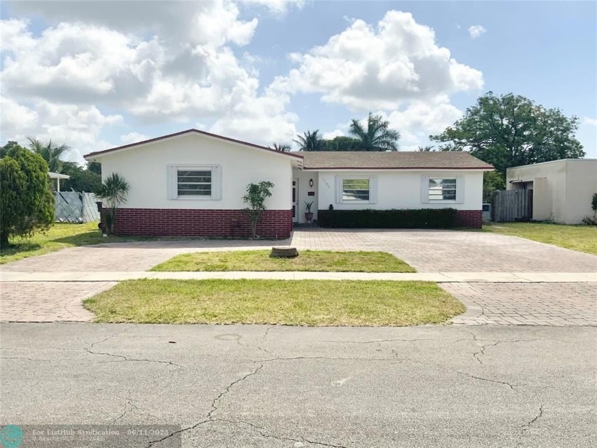 Come see this impeccable Waterfront 3 bed, 2 full bath home in - Beach Home for sale in North Lauderdale, Florida on Beachhouse.com