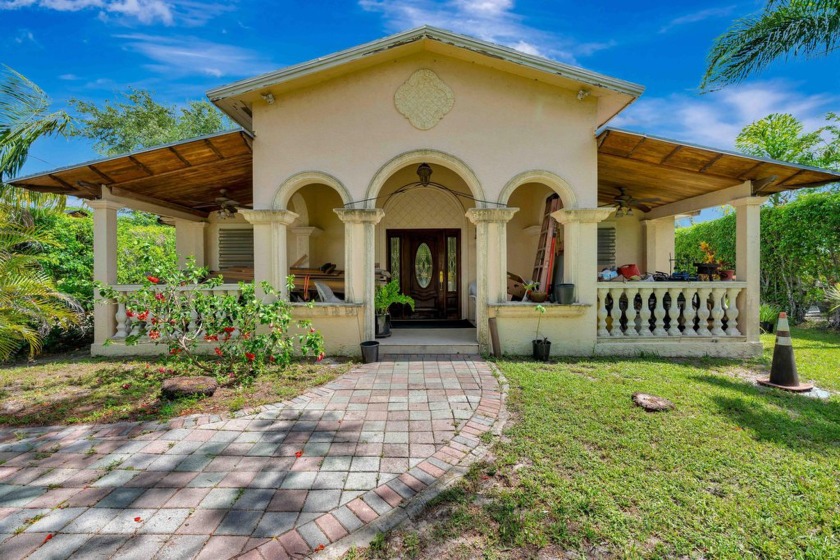 Opportunity of a lifetime to reside in this CBS estate home of - Beach Home for sale in West Palm Beach, Florida on Beachhouse.com