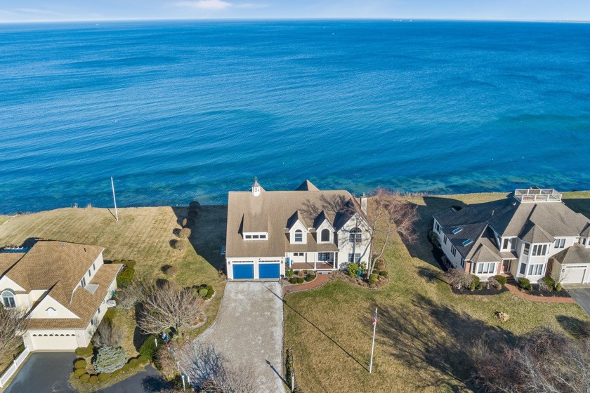 This single-owner custom colonial is perched high on a bluff at - Beach Home for sale in Plymouth, Massachusetts on Beachhouse.com