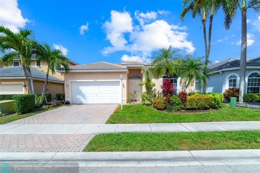 Beautiful 3-bedroom, 2-bathroom single-family home in Pelican - Beach Home for sale in Coral Springs, Florida on Beachhouse.com