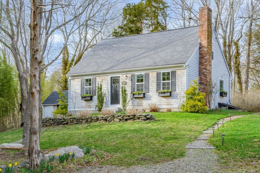 Privately set down a long driveway, this beautifully updated - Beach Home for sale in Barnstable, Massachusetts on Beachhouse.com