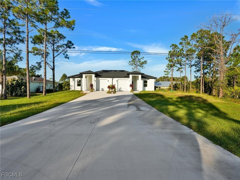 Modern and thoughtfully designed duplex that truly proves not - Beach Home for sale in Lehigh Acres, Florida on Beachhouse.com