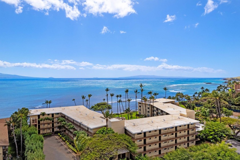 Through the front door of this two-bedroom, two-bathroom - Beach Condo for sale in Wailuku, Hawaii on Beachhouse.com