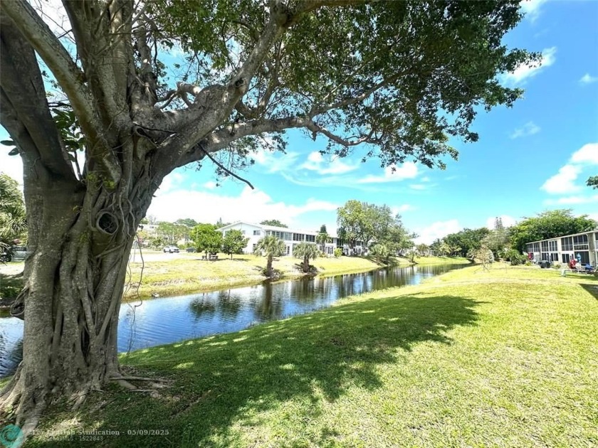 WATER VIEW!  This bright corner 2 bedroom, 1.5 bath on the - Beach Condo for sale in Deerfield Beach, Florida on Beachhouse.com