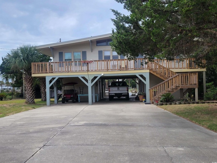 Welcome to your little piece of paradise with gorgeous sunsets - Beach Home for sale in Murrells Inlet, South Carolina on Beachhouse.com