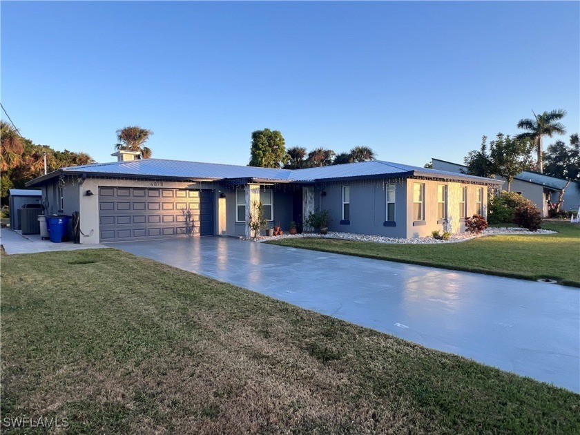 Meticulously renovated 3 bedroom home with enclosed heated salt - Beach Home for sale in North Fort Myers, Florida on Beachhouse.com