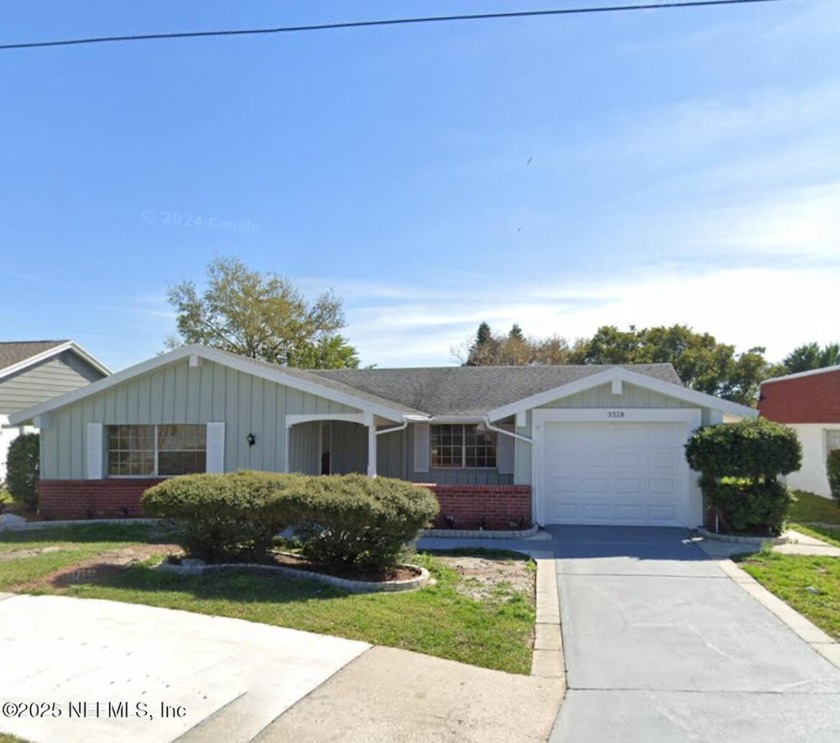 Enjoy Florida living in this updated 3-bedroom, 2-bath home - Beach Home for sale in Holiday, Florida on Beachhouse.com