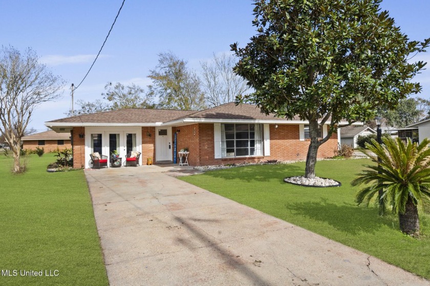 Nestled on a spacious corner lot in the heart of Long Beach - Beach Home for sale in Long Beach, Mississippi on Beachhouse.com