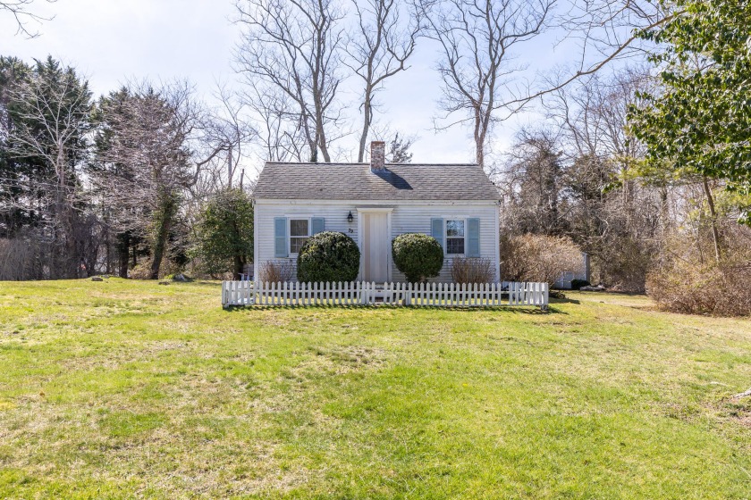 Located on a beautiful corner lot surrounded by quintessential - Beach Home for sale in Orleans, Massachusetts on Beachhouse.com