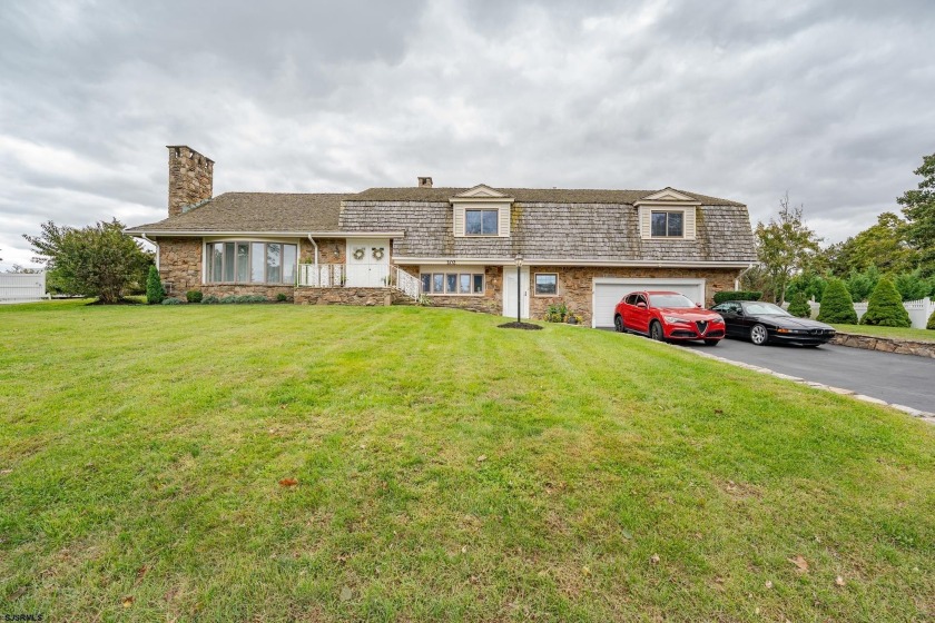 Situated on the Atlantic City Country Club golf course, this - Beach Home for sale in Northfield, New Jersey on Beachhouse.com