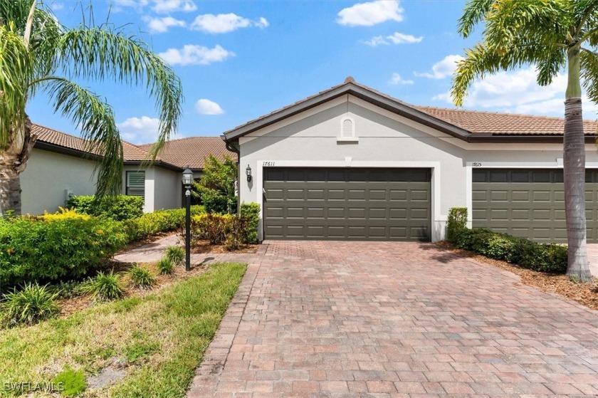 Snag this nearly-new water-view villa and dive into the - Beach Home for sale in Lakewood Ranch, Florida on Beachhouse.com