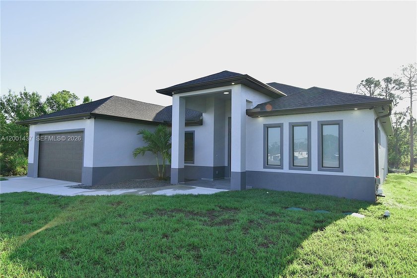 This beautiful home checks all the boxes! Located close to Joel - Beach Home for sale in Lehigh Acres, Florida on Beachhouse.com