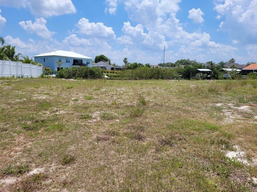 Huge vacant Lot (approx. 1/4 acre) with Huge Dock and Pilings - Beach Lot for sale in Apollo Beach, Florida on Beachhouse.com