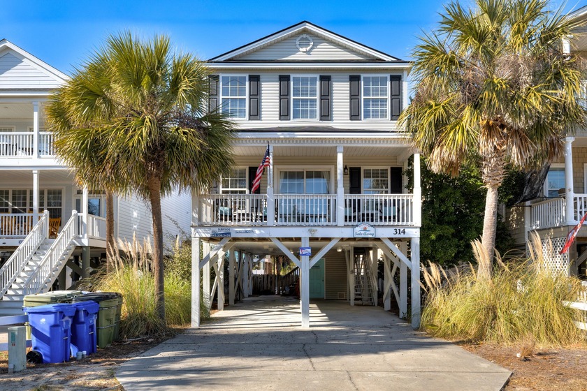 Just steps from the sand, this spacious 5-bedroom, 4-bath beach - Beach Home for sale in Surfside Beach, South Carolina on Beachhouse.com